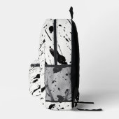 タイル状の黒い絵を描（ばちゃばちゃ）跳ねるパターン プリントバックパック (右)