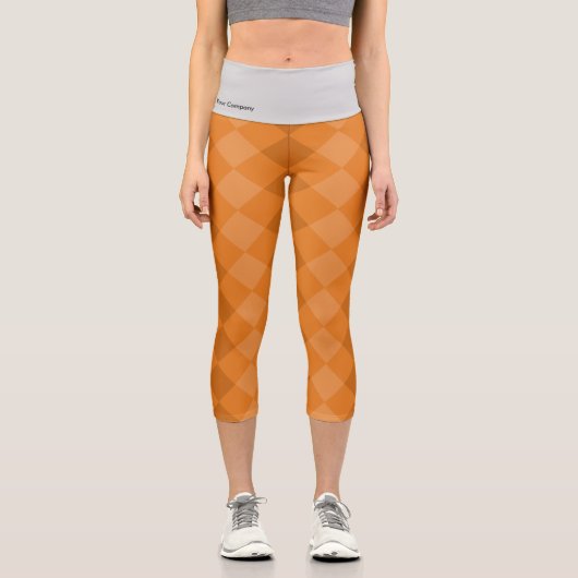 タイル自然パターンオレンジとグレーのタグライン カプリレギンス (正面)