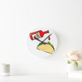 タコに落ちるホットソース ラウンド壁時計 (ホーム)