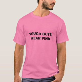 タフガイはピンクを身に着けています Tシャツ