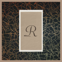 タンとブラウンのモノグラム入りミニマル ニュートラルカラー