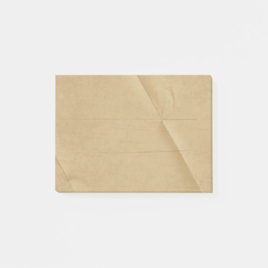 タンのクリームによって折られる折り目を付けられていた背景 ポストイット (正面)