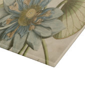 タンバックグラウンドに咲く青い蓮書の花 カッティングボード (角)