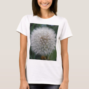 タンポポの種が付いた花のTシャツ Tシャツ