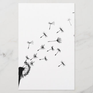 タンポポ風で吹く