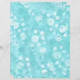 ターコイズのスクラップブック紙の上の白とターコイズブルーの水泡