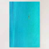 ターコイズのBora Boraの礁湖の舷外浮材付きのカヌー ジグソーパズル (縦)