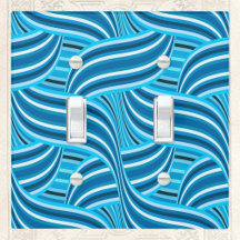 ターコイズティール（緑がかった色）と青い渦巻きリボン