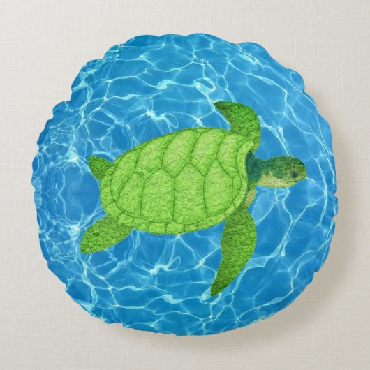 ターコイズブルーの水面に緑のウミガメ ラウンドクッション (正面)