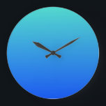 ターコイズブルーグラデーション ラージ壁時計<br><div class="desc">、プシンプルレーンブルー、ターコイズグラデーション、またはグラデーションの背景メッセージを追加でパーソナライズされたきます。</div>