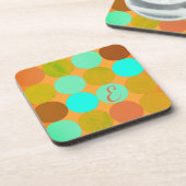 ターコイズブルーグリーン&オレンジサークルモノグラム コースター (左側)