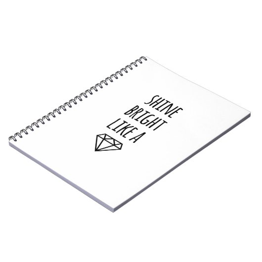 ダイヤモンドスパイラルノートのように明るく輝く ノートブック (左側)