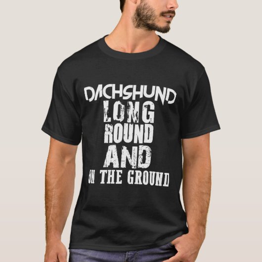ダックシュントが地面の上を回る Tシャツ (正面)