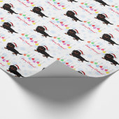 ダックスフントのタンの長い髪の黒およびクリスマス ラッピングペーパー (角)