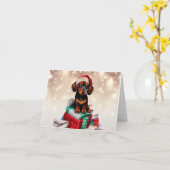 ダックスフンドのクリスマス子犬グリーティングカード カード (黄色い花)