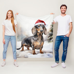 ダックスフンドの犬と雪のクリスマス フリースブランケット