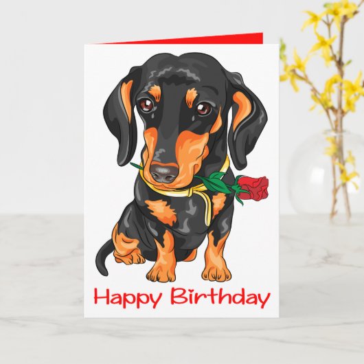 ダッチシュント子犬の漫画かわいい犬の誕生日 カード (黄色い花)