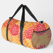 ダリア花、花のパターン、オレンジ色のダリア ダッフルバッグ (右コーナー)