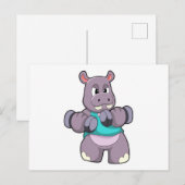 ダンベルを使ったボディービルディングをするカバ ポストカード (正面/裏面)