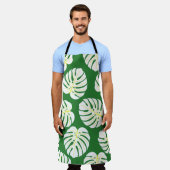 ダーの上の白いモンステラ葉の継ぎ目のないパターン エプロン (着用した状態)
