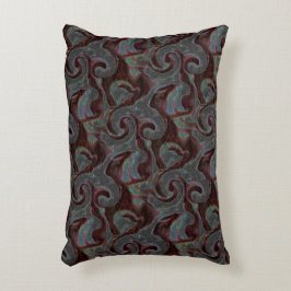 ダークカラーの彫刻されたスパイラルパーツとグローストローク アクセントクッション
