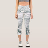 ダークグリーンとティール（緑がかった色）モンステラ離れのとライリーの輪郭 カプリレギンス (正面)