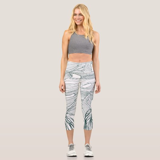 ダークグリーンとティール（緑がかった色）モンステラ離れのとライリーの輪郭 カプリレギンス (正面)