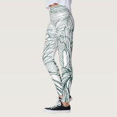 ダークグリーンとティール(緑がかった色)モンステラ離れのとライリーの輪郭 レギンス (左)