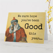 ダークユーモア銃を持つクリスマスサンタ カード (黄色い花)