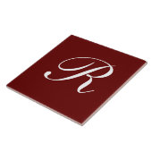 ダークレッドの上に白のRモノグラム。 タイル (側面)