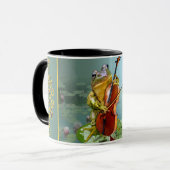 チェロを演奏しているカエルを持つこっけいなmu マグカップ (正面左)