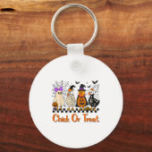 チキンシックまたは楽しいハロウィーンのコスチュームを遠くまで扱う キーホルダー (正面)
