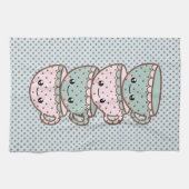 チビキャラのドット模様のティーカップ 重ねたピンクとブルー キッチンタオル (横)