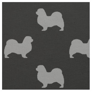 チベットのスパニエル犬はパターンのシルエットを描きます ファブリック