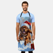 チベットのスパニエル犬走のクリスマス帽子と雪の中 エプロン (着用した状態)