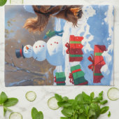 チベットのスパニエル犬走のクリスマス帽子と雪の中 キッチンタオル (折り畳み)