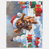 チベットのスパニエル犬走のクリスマス帽子と雪の中 フリースブランケット (正面)
