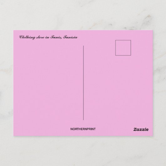 チュニス・チュニジアの洋服店と花 ポストカード (裏面)