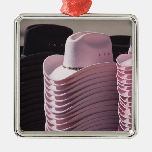 チューソン、アリゾナ。 男性へカーボーイ・ハットおよび女性 メタルオーナメント (正面)