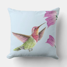 チューリップと一緒に飛行する美しいハミングバード