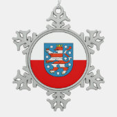 チューリンゲン州旗スノーフレークペータークリスマスオルナム スノーフレークピューターオーナメント (正面)