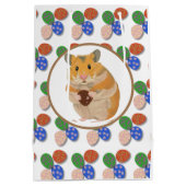 チョコレートの卵を持つイースターハムスター ミディアムペーパーバッグ (裏面)