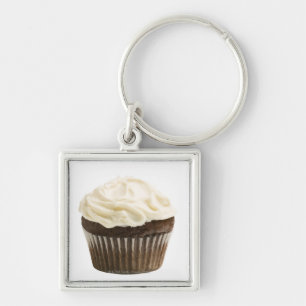チョコレートアイシング、スタジオが付いているカップケーキは2つを撃ちました キーホルダー
