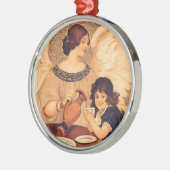 チョコレートエンジェルフランスのアンティーク メタルオーナメント (左)