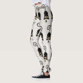 チーズの漫画キャラクターと猫とおもしろい レギンス (左)