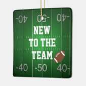 チームの新機能 – ベビー初のクリスマスサッカー セラミックオーナメント (左)