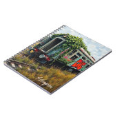 ツタと落書きに覆われた放置された列車 ノートブック (左側)