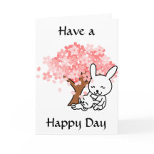 ツリーカードの下にハッピーデー、かわいいバンニーを持っている
