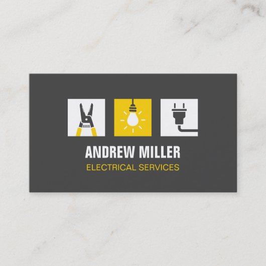 ツール電球とプラグロゴ電気技師 名刺 (正面)
