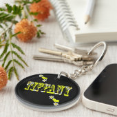 ティファニー、フランジパニの花と女性の名前のロゴ、 キーホルダー (正面右)